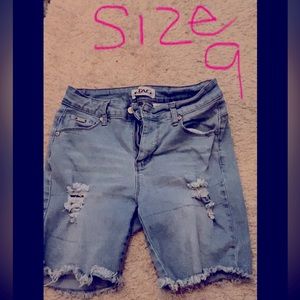 Washed out ripped styled capris